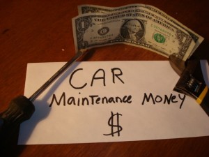 Car maintenance money and wrench
