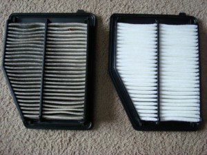 See the old air filter on the left with 20 K miles since being replaced last.