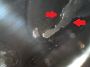 Notice oil deposits between two red arrows on valve.