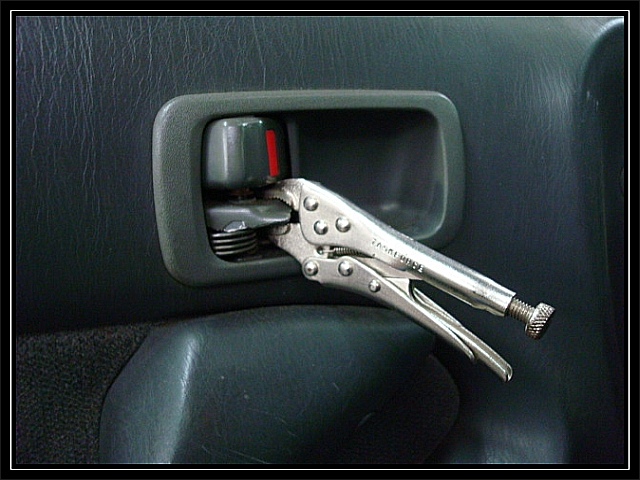 Vise grips used as an inside door handle. you just gotta love it!